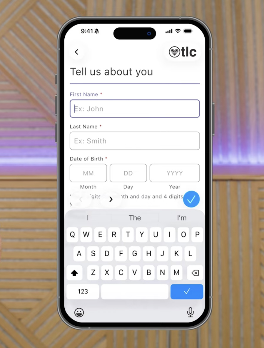 Phone screen showing a form titled 'Tell us about you' with First Name, Last Name, Date of Birth fields and a blue submit button; on-screen keyboard visible at bottom.